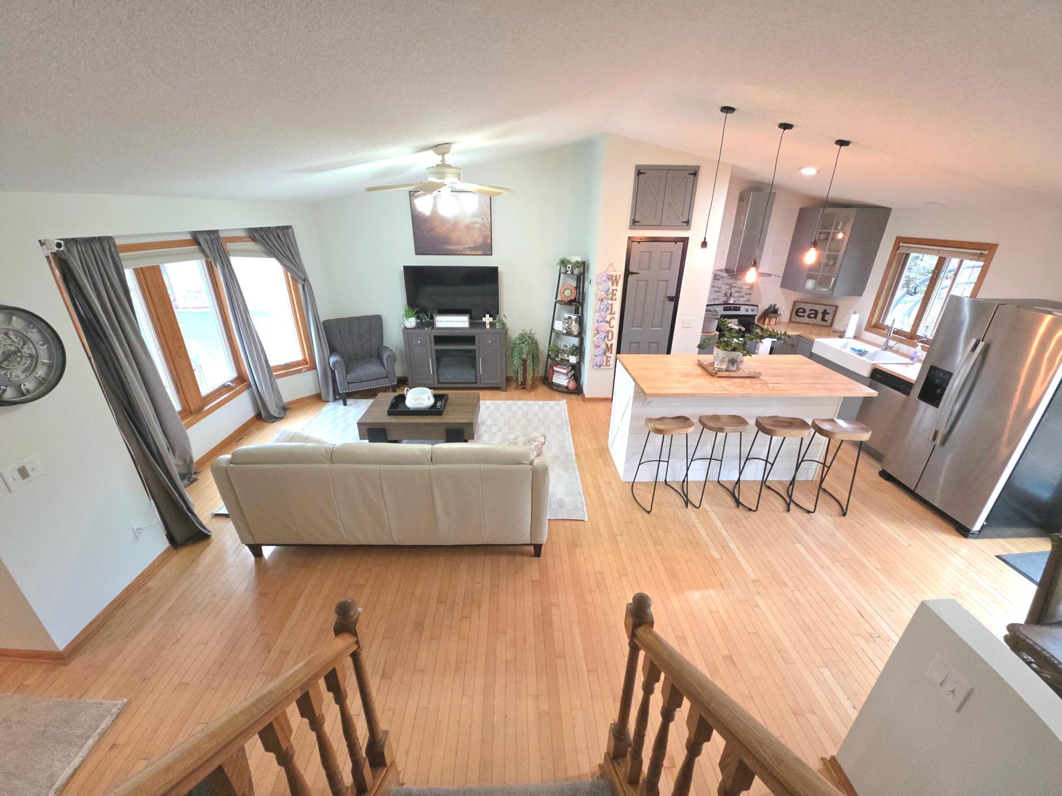 Aerial view of main level (kitchen, dining, and living room