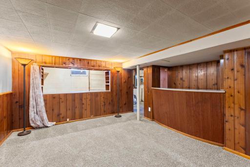 Lower level bar and entrance to laundry room.