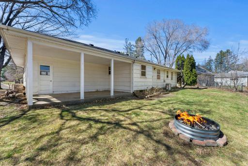 Covered patio and fire pit. Perfect for spending time grilling and hanging with loved ones!