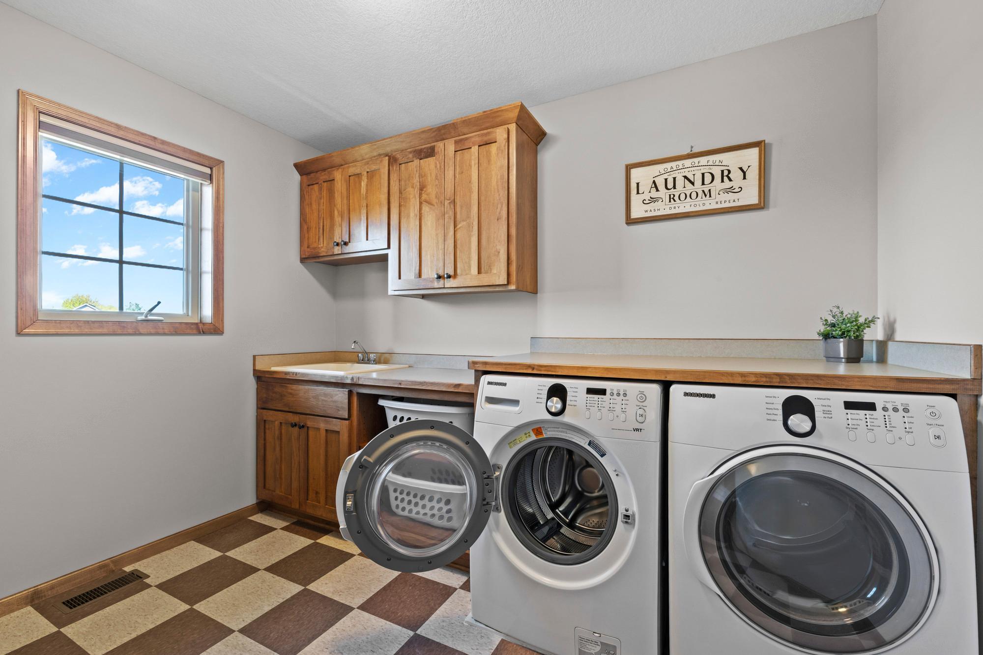 Laundry located on upper level where 4 bedrooms are located