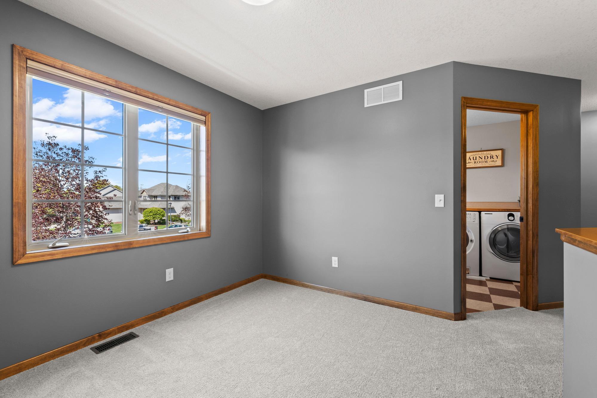 Spacious and bright loft area, perfect for an at-home office space.