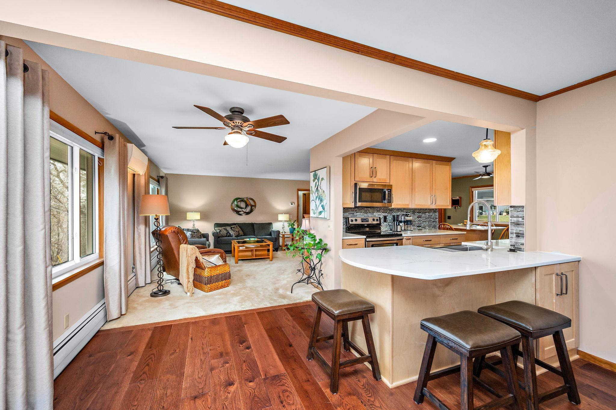 Lots of can lights, smooth ceilings, and beautiful floors!