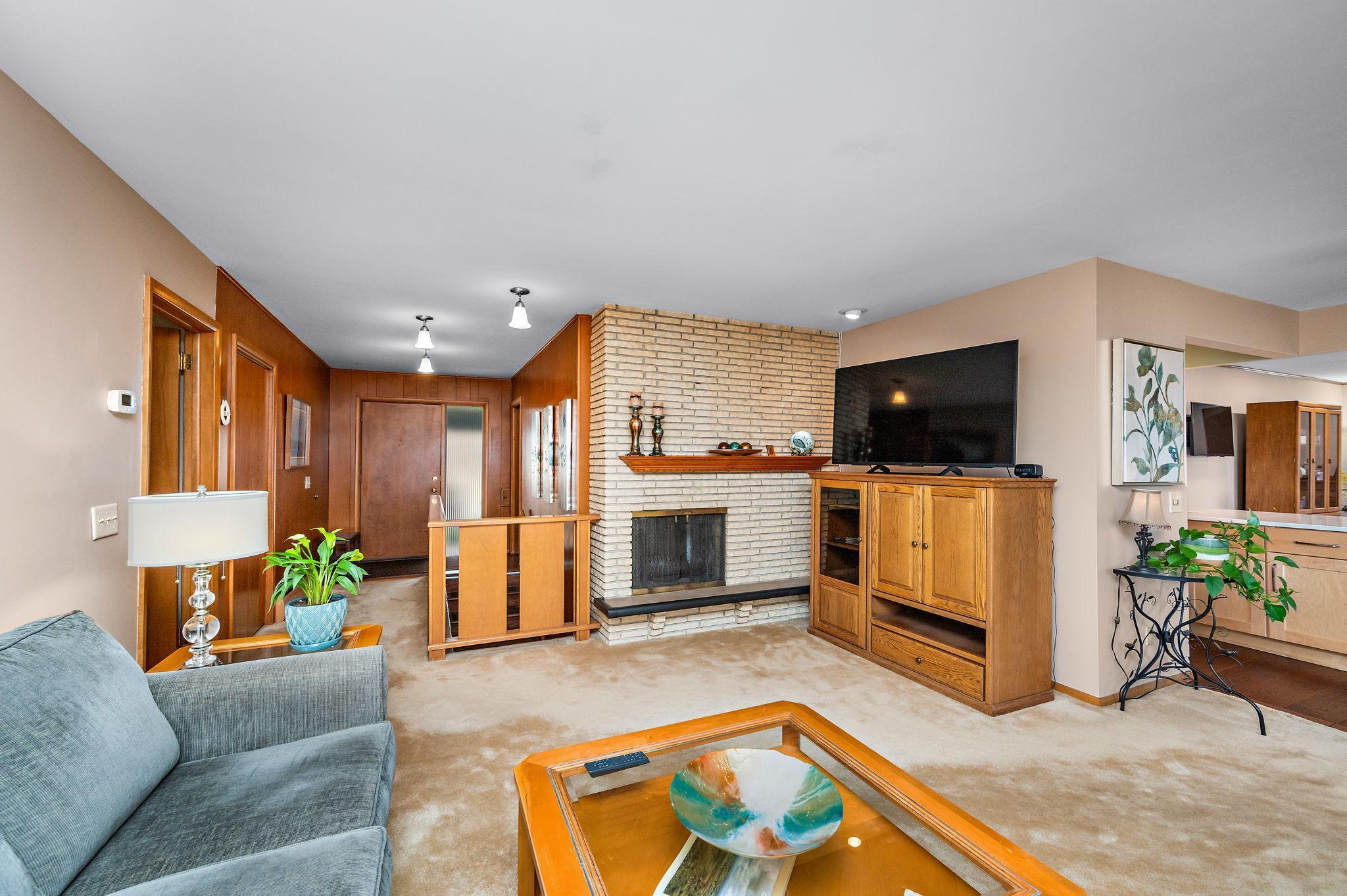 Spacious family room with brick fireplace!