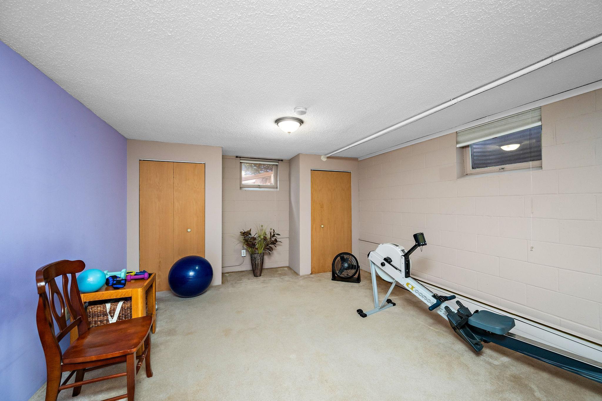 The seller uses this space as a workout room, but would also work well as an office, hobby room, playroom, or even a 5th bedroom with an egress window!