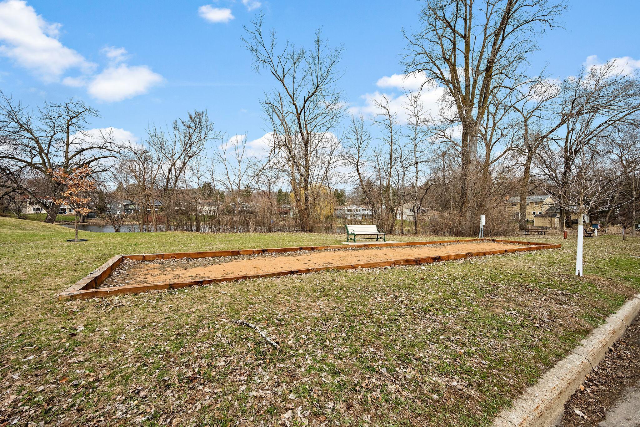 The pond across the street makes for a great neighbor and view, and there's even a bocce pit!