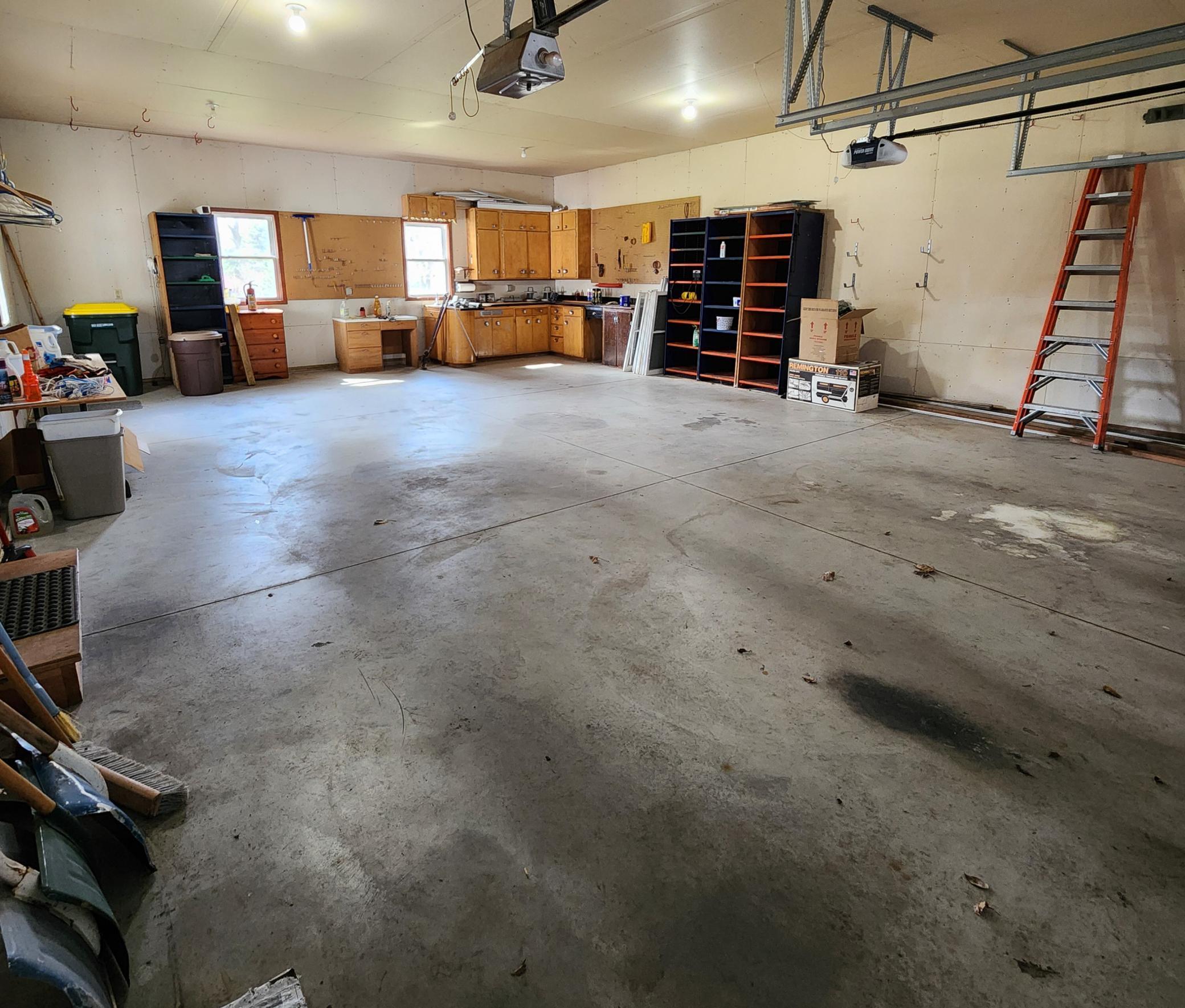 The oversized 26 by 35 foot double garage ensures you have plenty of space to work, play or entertain. .jpg