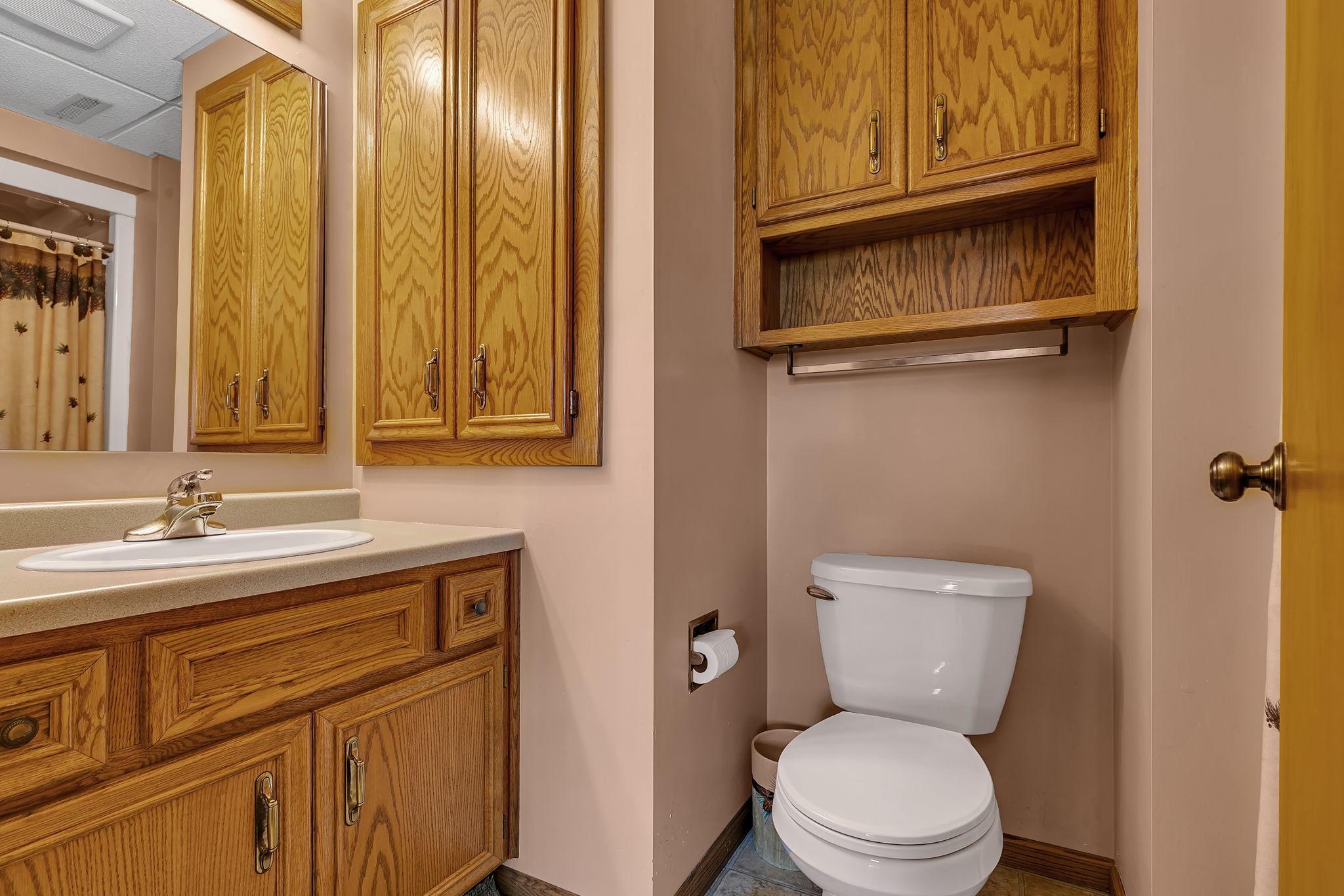 3/4 bathroom w/laundry shute.