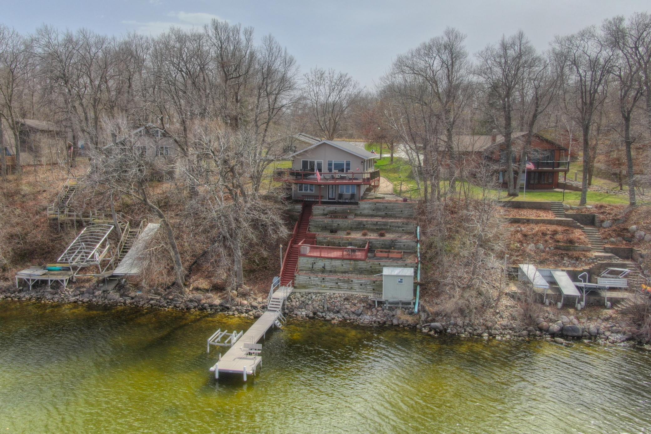 Welcome to Lake Koronis where you will find this wonder four bedroom, two bathroom home with a three stall garage and a bunk house.