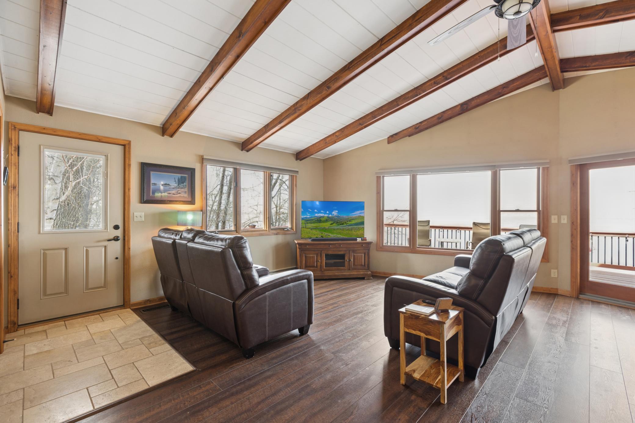 As you enter the home you are greeted by the open design with a wall of windows lakeside to enjoy the breathtaking views of Lake Koronis and all four seasons that Minnesota has to offer.