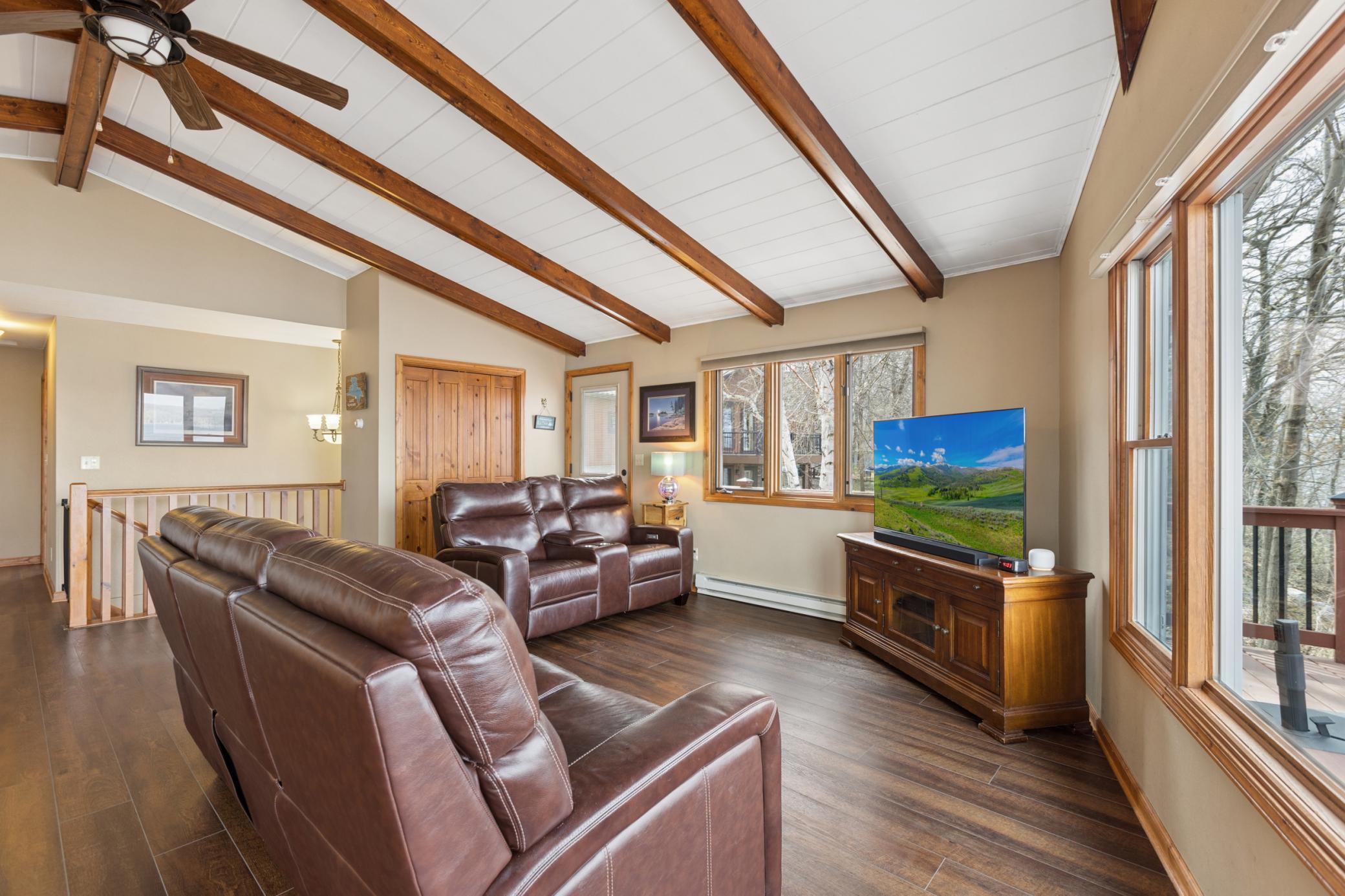 As you enter the home you are greeted by a nice sized closet that is ready for all four seasons that Minnesota has to offer. The main floor living room offers panoramic views looking out over Lake Koronis.