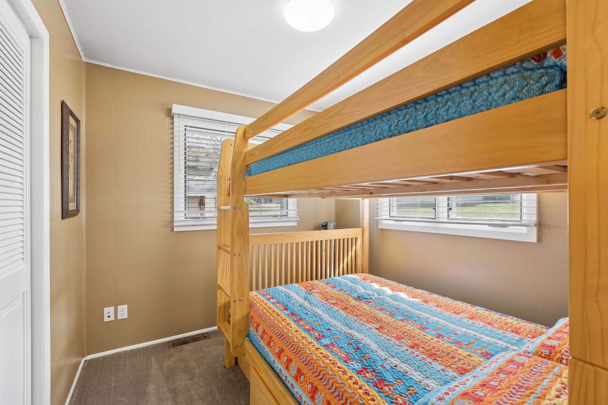 View of the second main floor bedroom.