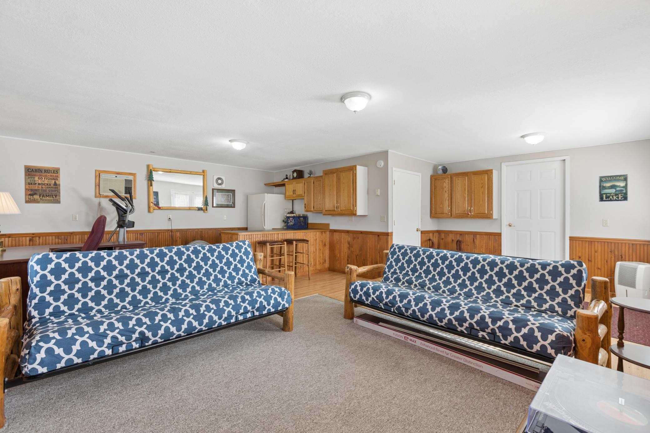 The door on the far right of this photo leads into the 2-stall garage and the other door leads to a nice sized walk-in closet/storage room.