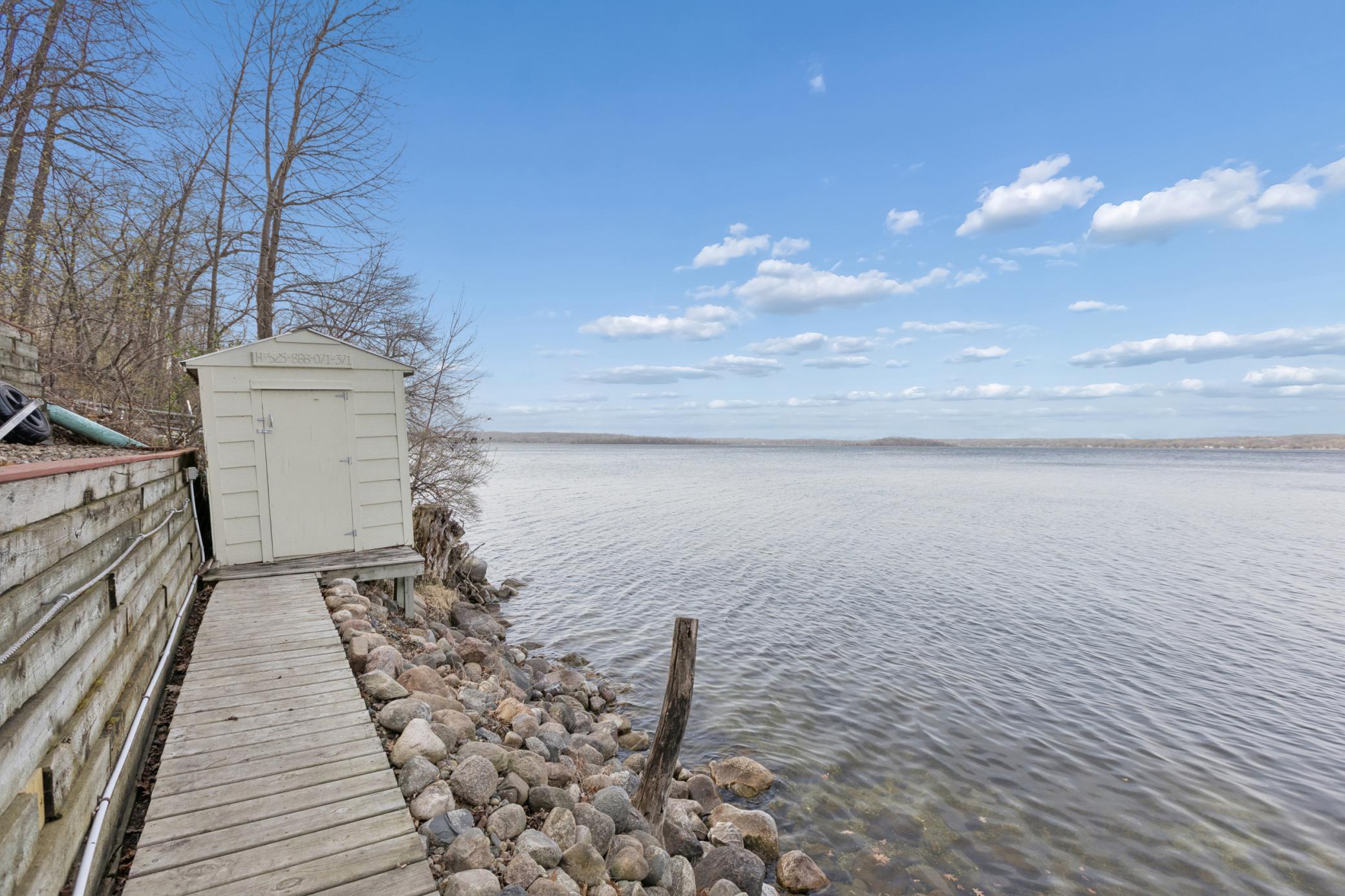 Built onto the riprapped shoreline is a shed that is perfect for all of your fishing gear and lake toys without having to bring them down from the house or garage. This property offers 82 feet of beautiful private shoreline on Lake Koronis.