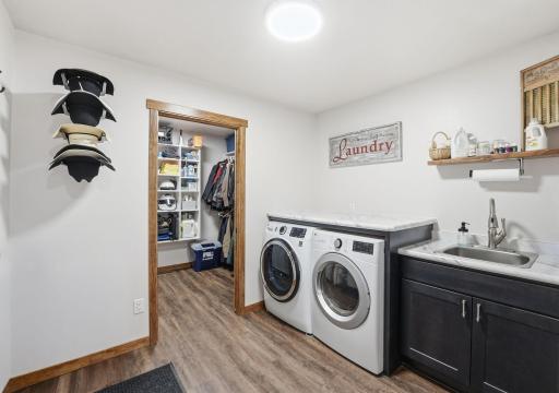 Main level laundry with access from 2 car garage. Bonus walk in coat/storage room.