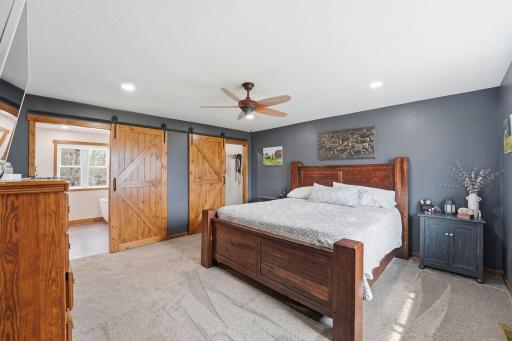 Main level master suite! Large his/hers walk in closets with beautiful barn doors! Full private master bathroom with soaking tub and seperate shower!