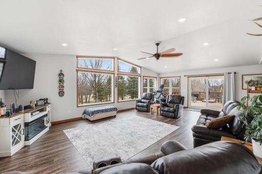 Living room walks out onto deck area. Great for relaxing or entertaining!