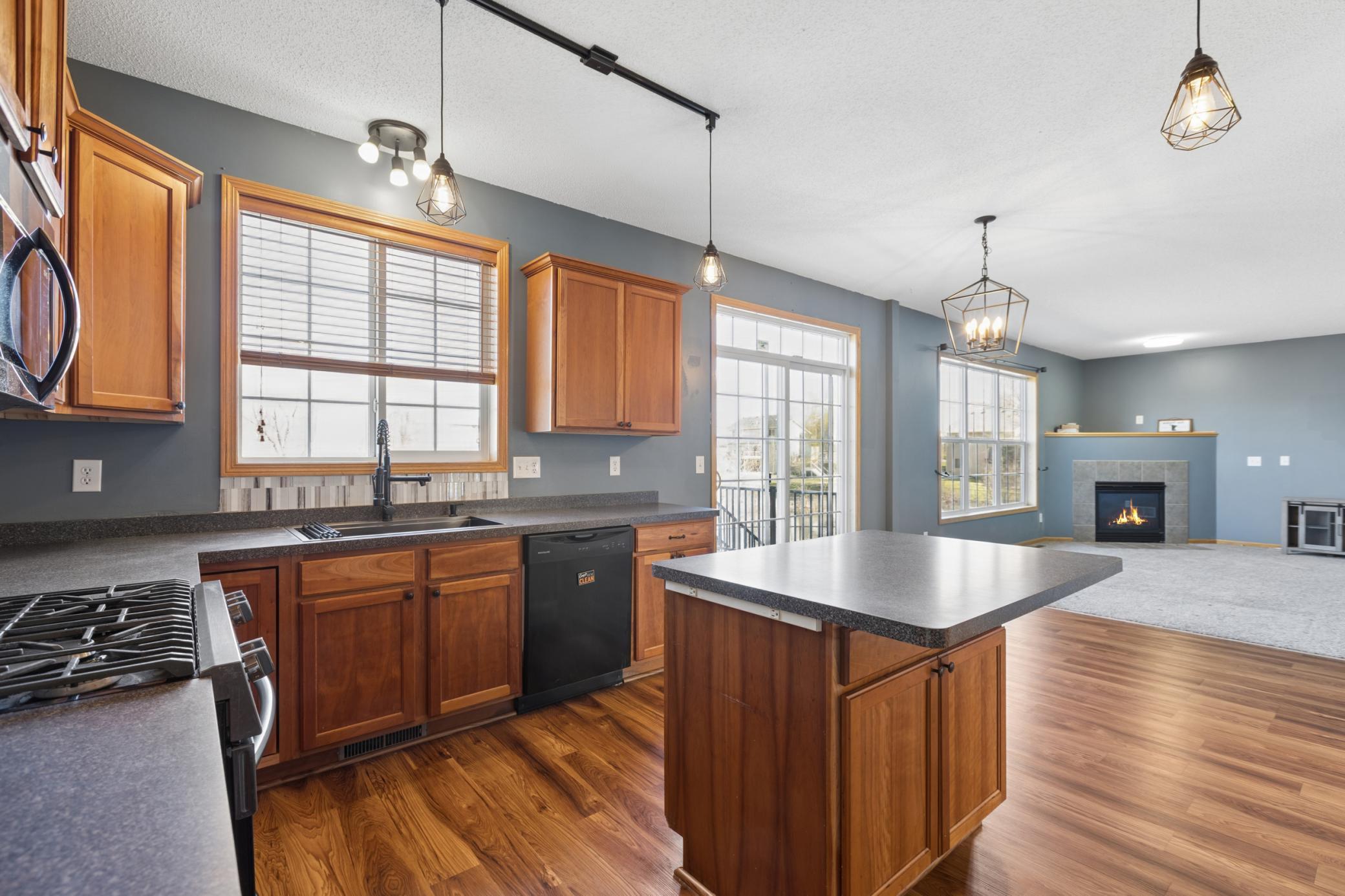 Gorgeous Kitchen with Center Island and Stainless Steel Appliances