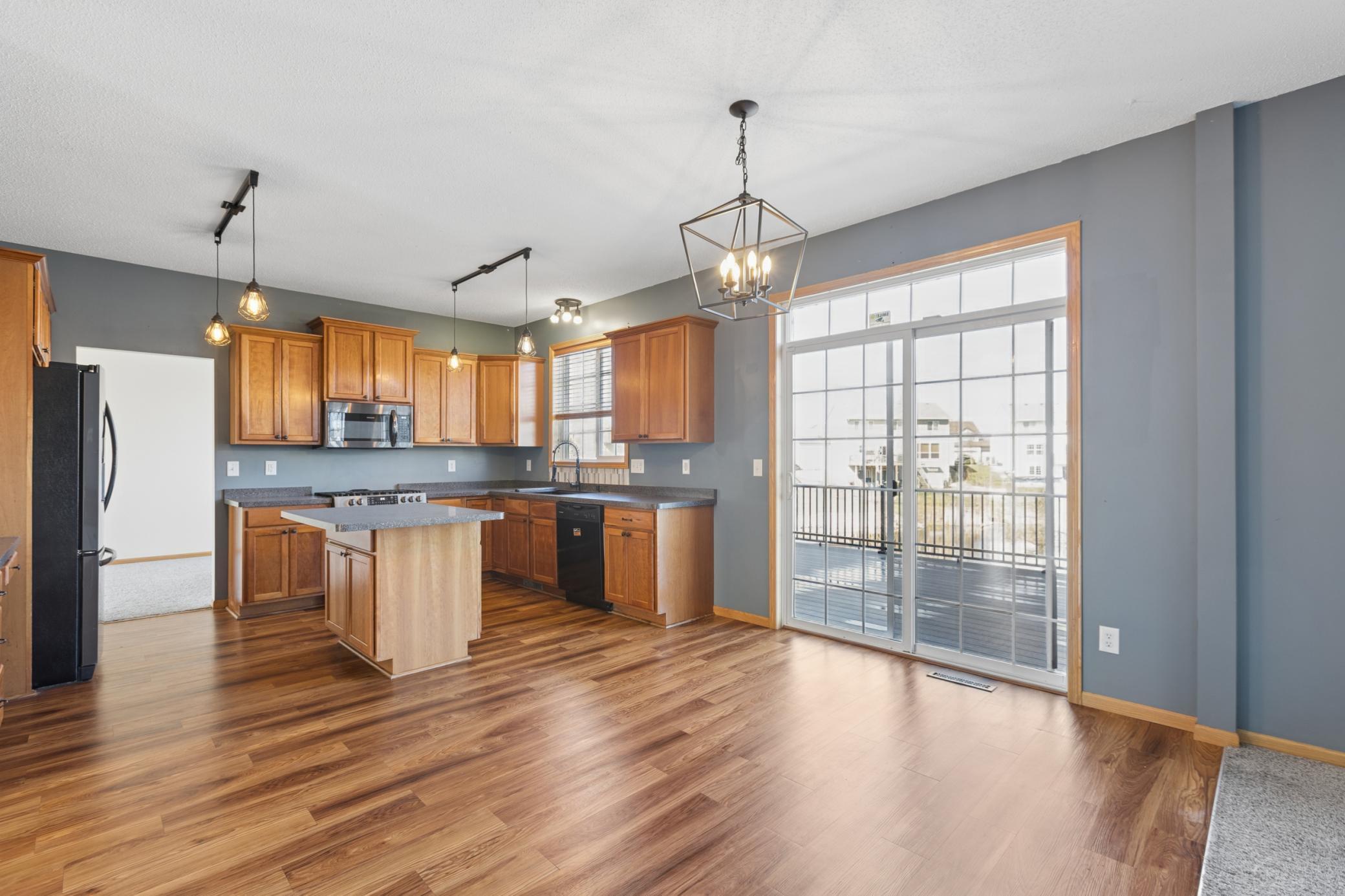 Gorgeous Kitchen with Center Island and Stainless Steel Appliances