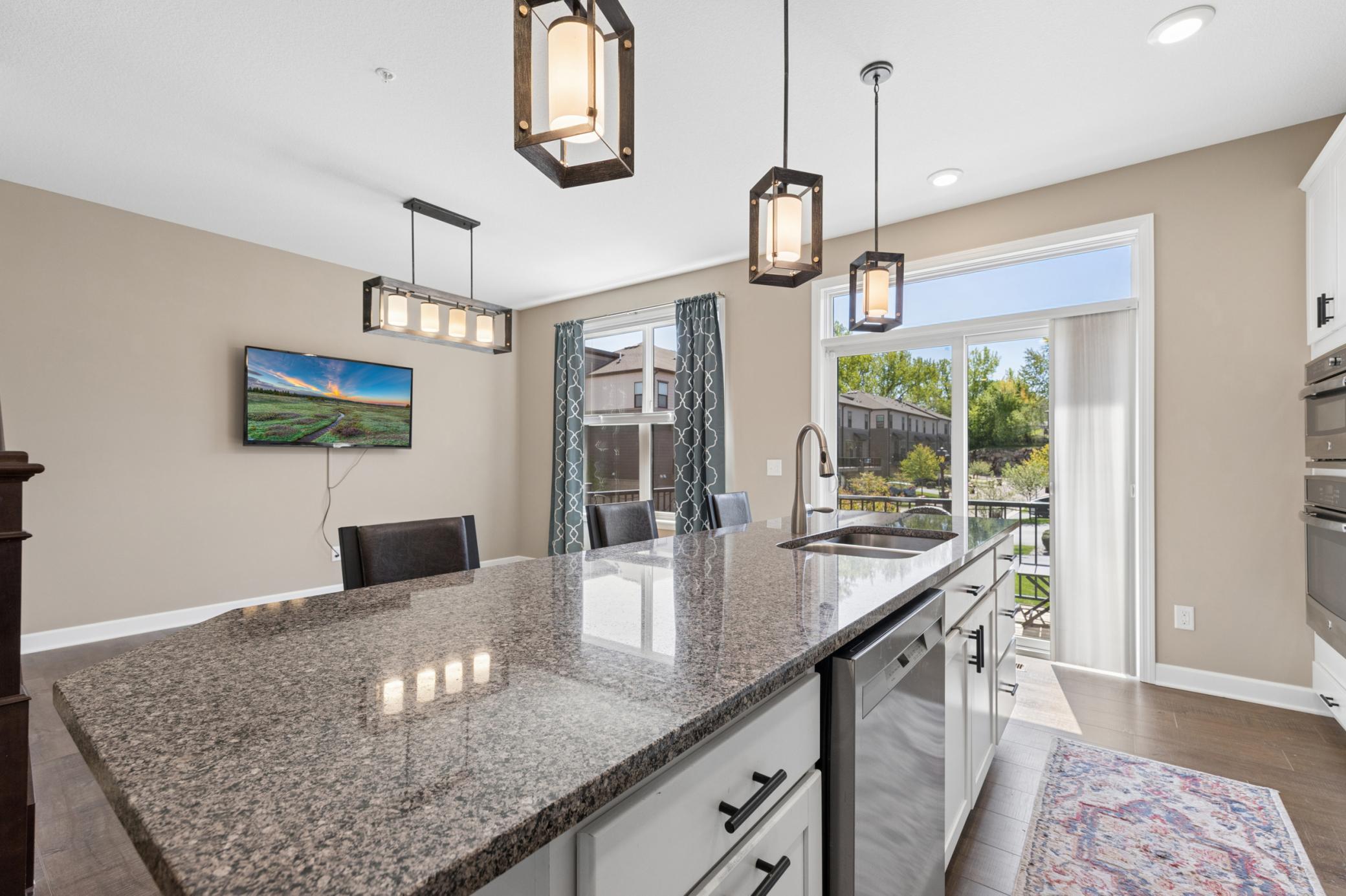 Gorgeous center island provides plenty of entertaining or prep space.