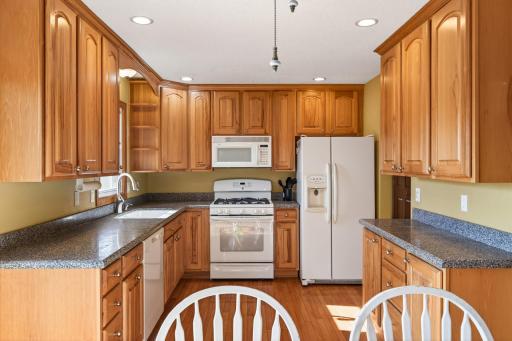 All white appliances create a clean, cohesive look that is easy to maintain.