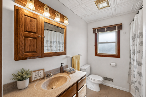 Enjoy the convenience of two full bathrooms, providing added flexibility and making busy mornings a breeze.