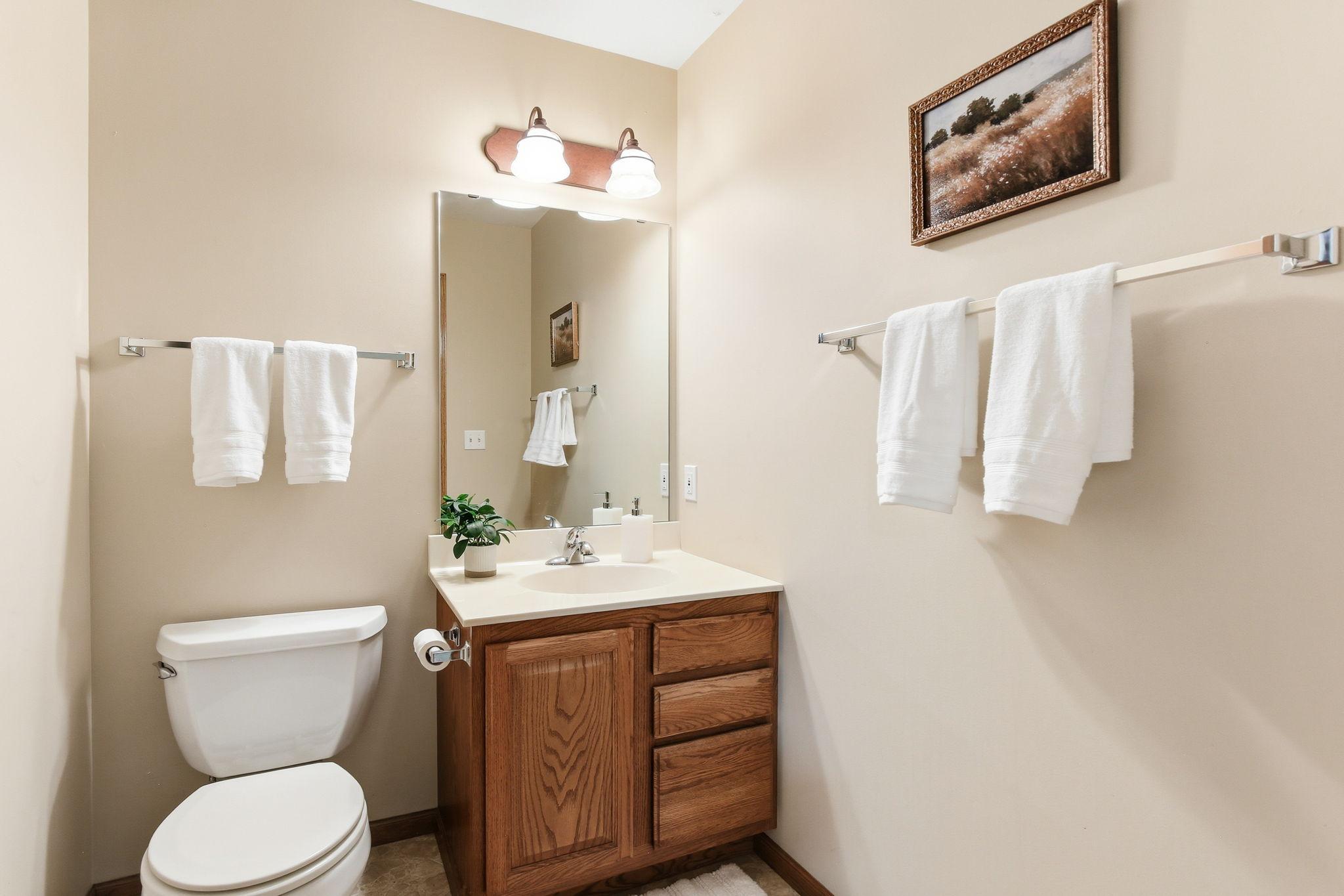 Nice 1/2 bath off the by garage entrance and laundry.