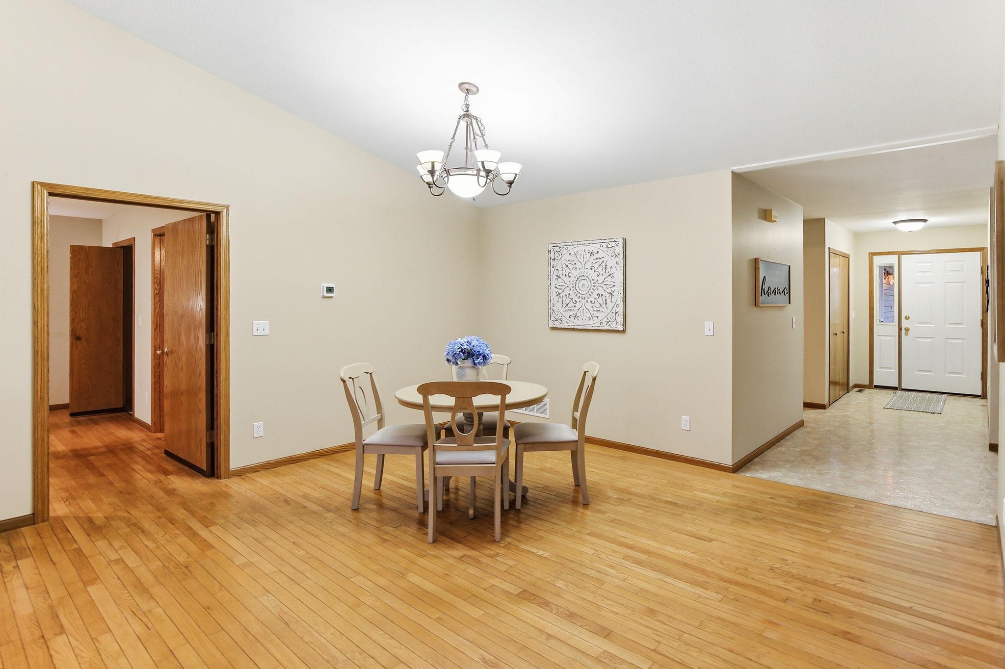 Open dining space with hardwood floors, connecting easily to the main living areas.
