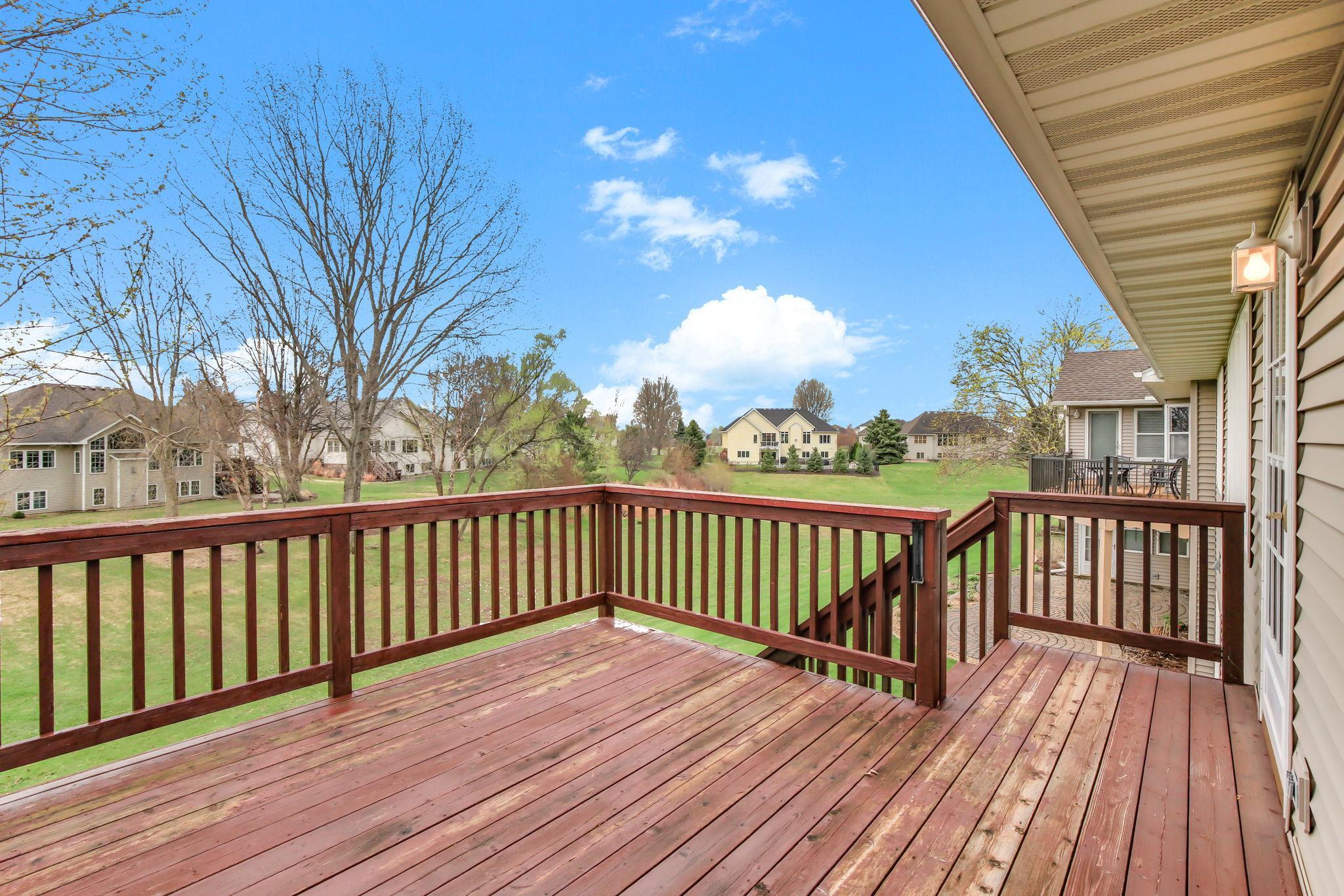 Deck off the great room overlooking the backyard with plenty of space to relax or entertain.
