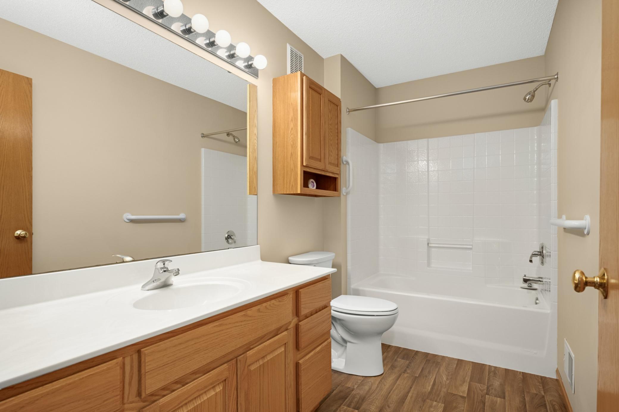 Full guest bathroom located adjacent to the guest bedroom for convenience