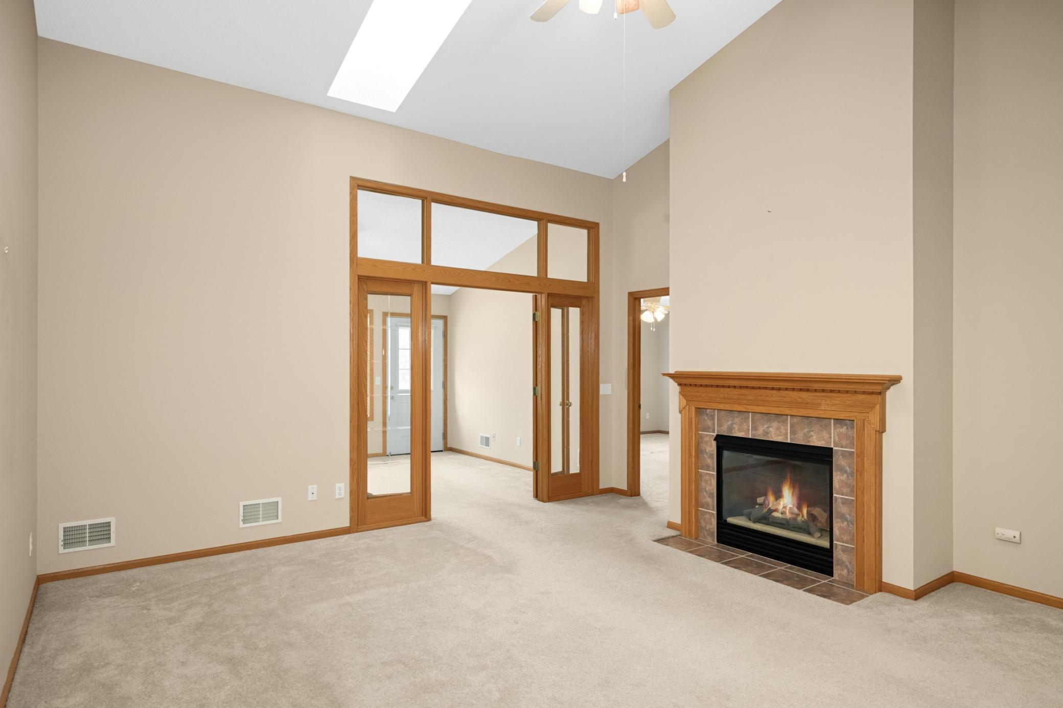 Skylight in the vaulted ceilings fills the space with abundant natural light