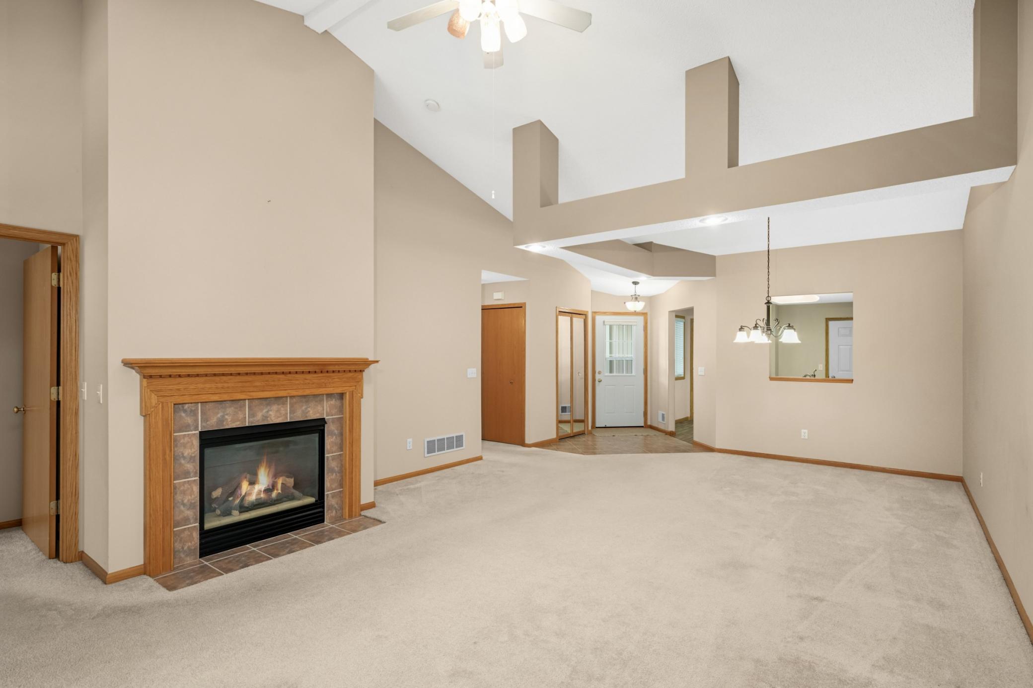 Vaulted ceilings with recessed lighting enhance the open feel and add a bright, modern touch