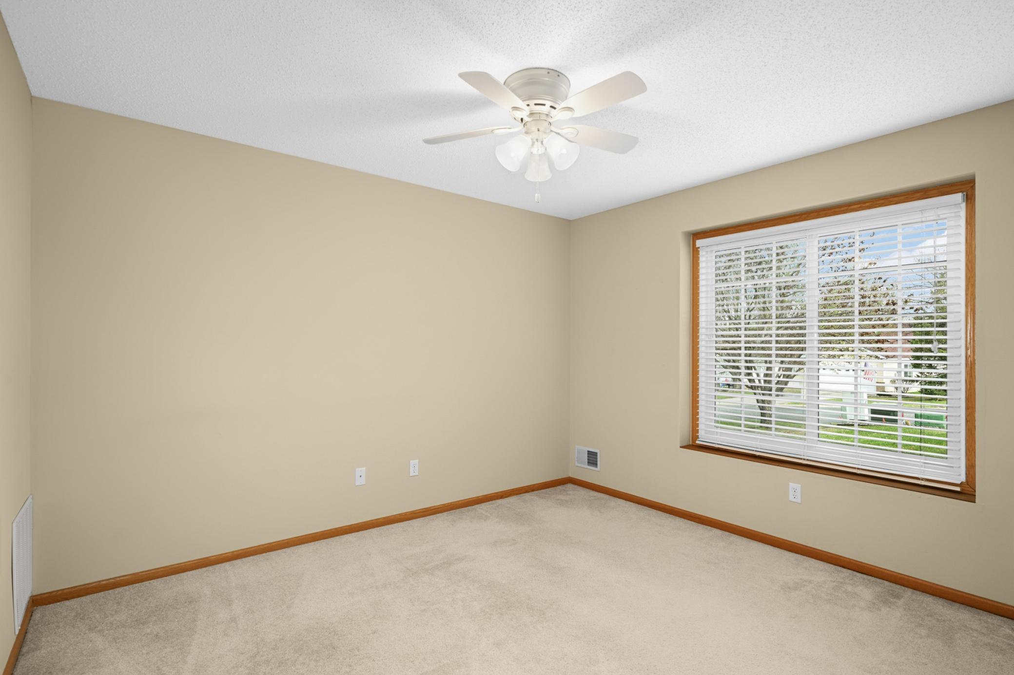 Guest bedroom conveniently located next to the full bathroom for added privacy