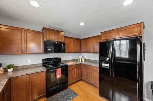 Enjoy sleek appliances and abundant cabinetry.