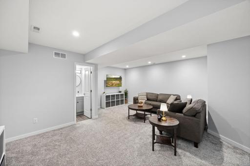 Large family room ideal for relaxing or entertaining.