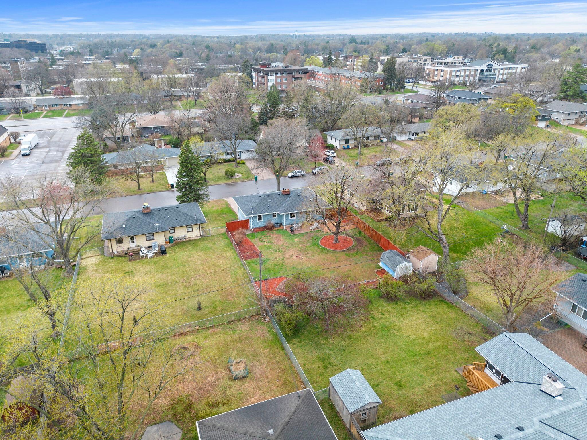 Recent updates include a new roof (2020), new windows (2026), newly refinished hardwood floors (2026), a new main sewer liner to the street (2023), a new furnace (2023), granite countertops and kitchen appliances (2024), and refreshed landscaping.