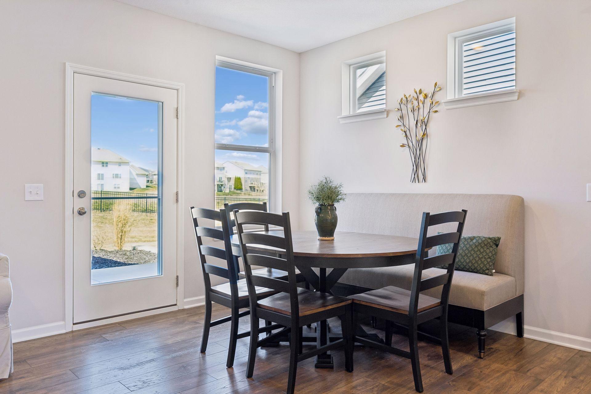 Dining opens off kitchen and great room, plus leads to patio