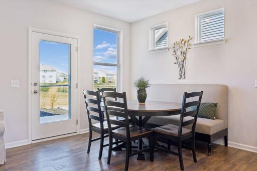 Dining opens off kitchen and great room, plus leads to patio