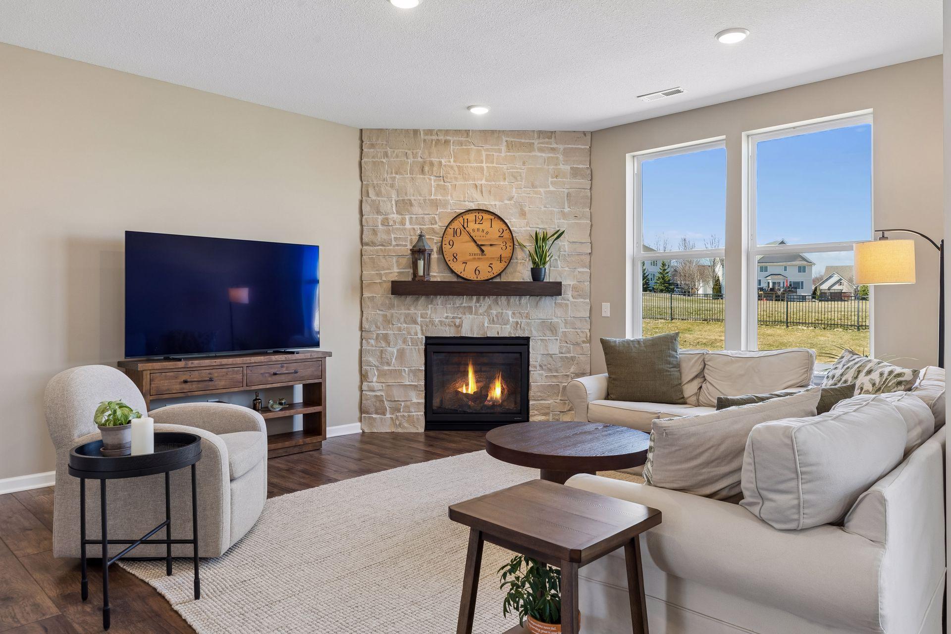 Great room with custom stone gas fireplace