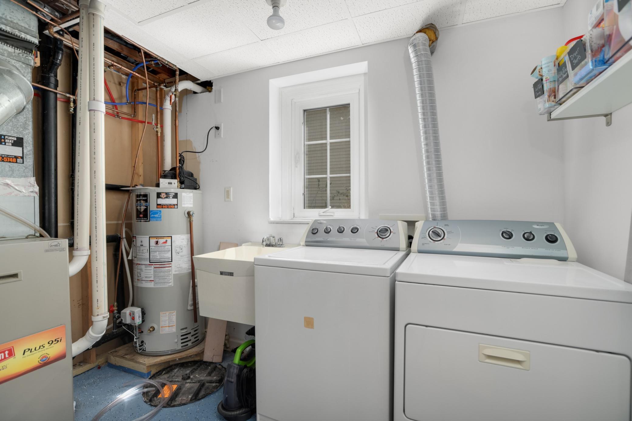 The laundry room features a window for natural light!