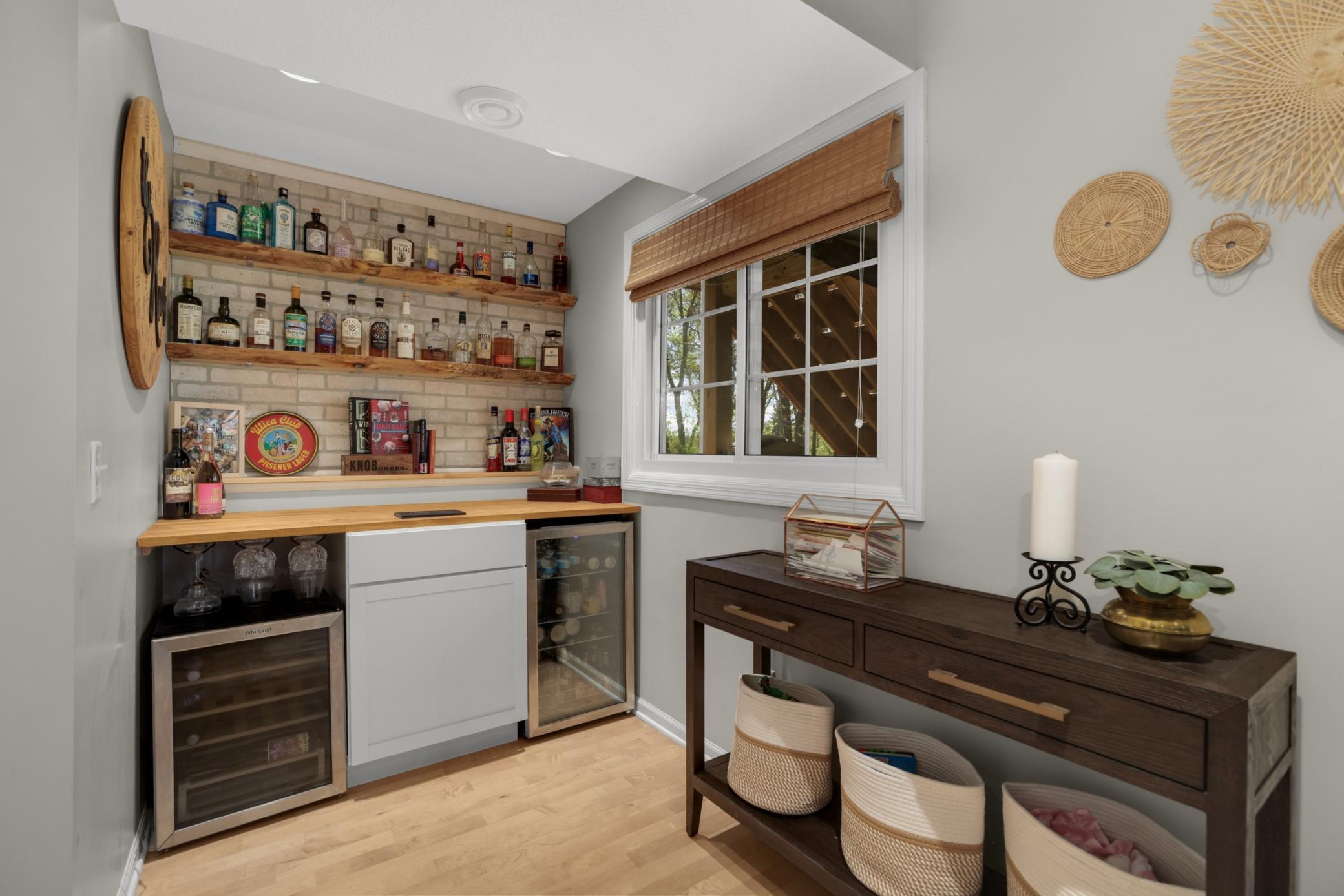 The bar is such a nice touch in this space!
