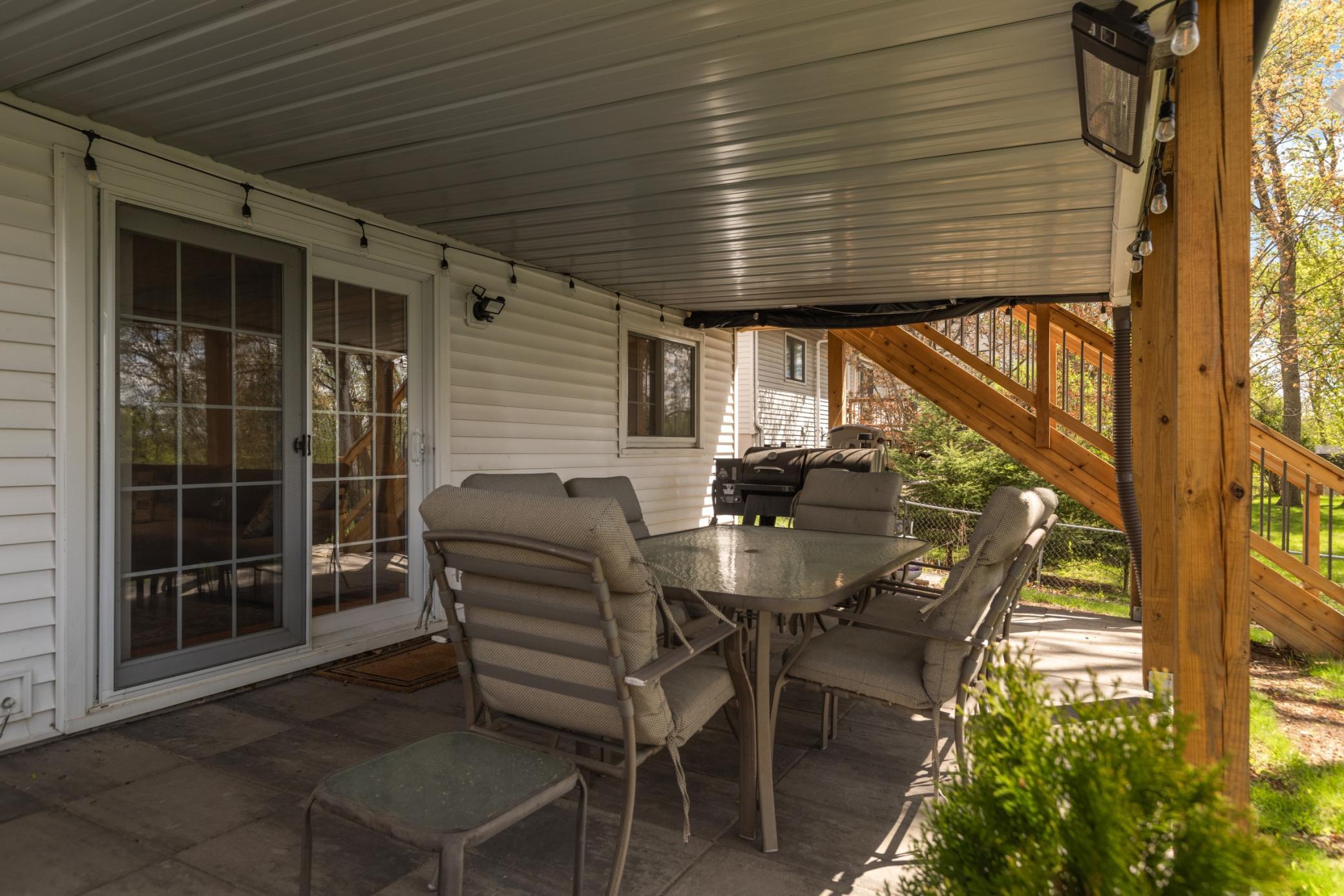 This is so cool!! The sellers made the lower patio into another living space. Featuring rain guard, and roll down "windows" with added heaters to make this space useable and cozy!