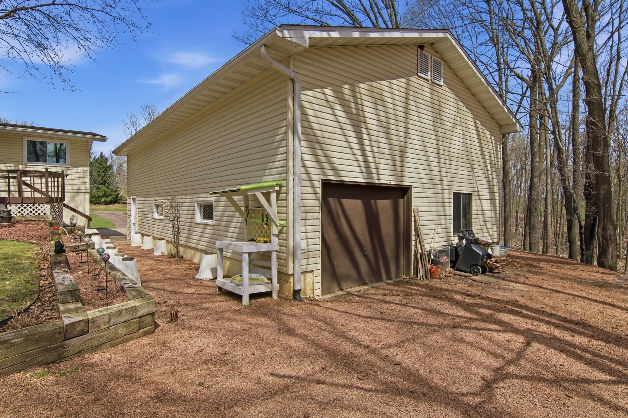 28' x 44' 4 car detached garage w/rear door for more versatility!