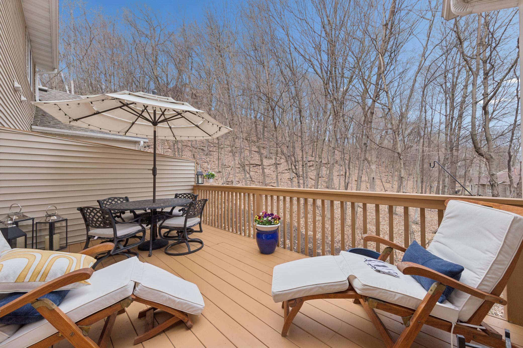 Sun or dine on the maintenance free deck off the sunroom