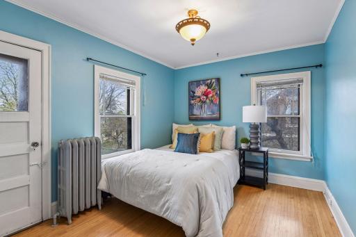 Another Spacious bedroom with warm hardwood floors