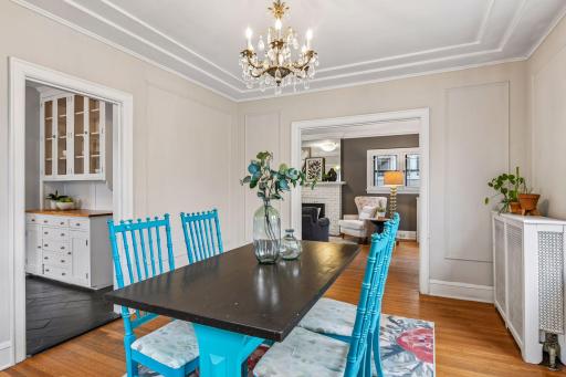 Character filled home with crown molding and vintage chandeliers