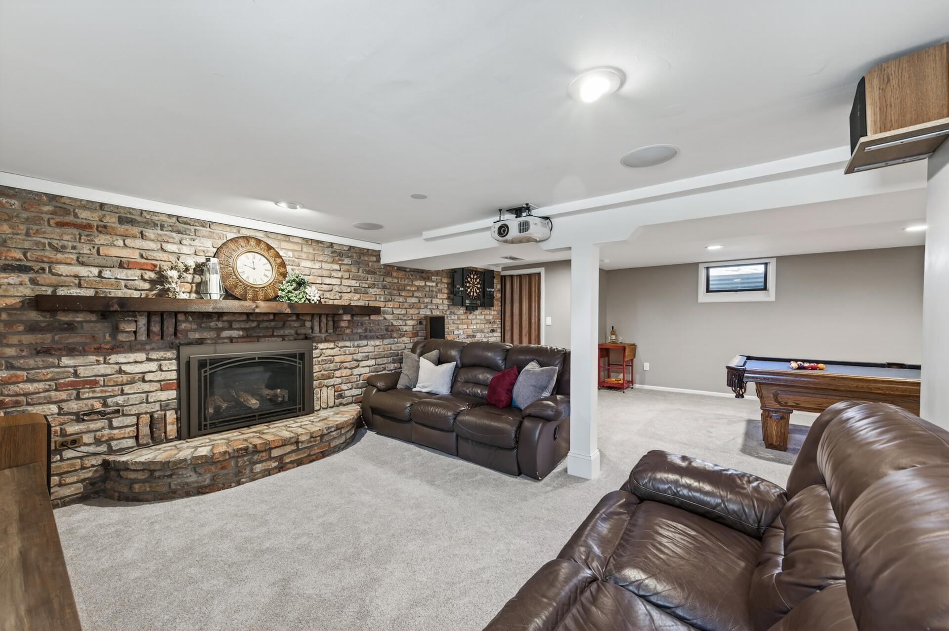 Stunning brick fireplace. Gas Burning.