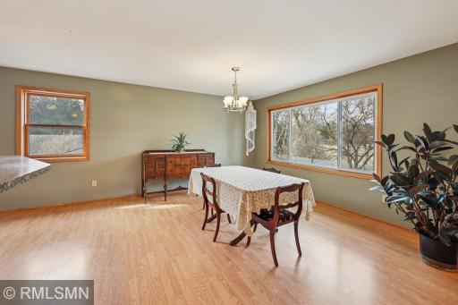 Beautiful light-filled dining room, plenty of space for a huge table-You enjoy views of the pond from this room