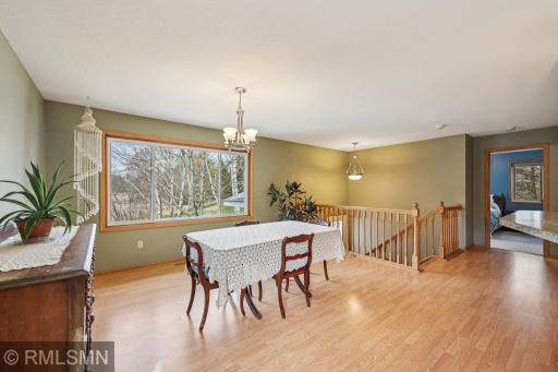 The upper-level bedroom is to the left at the top of the stairs