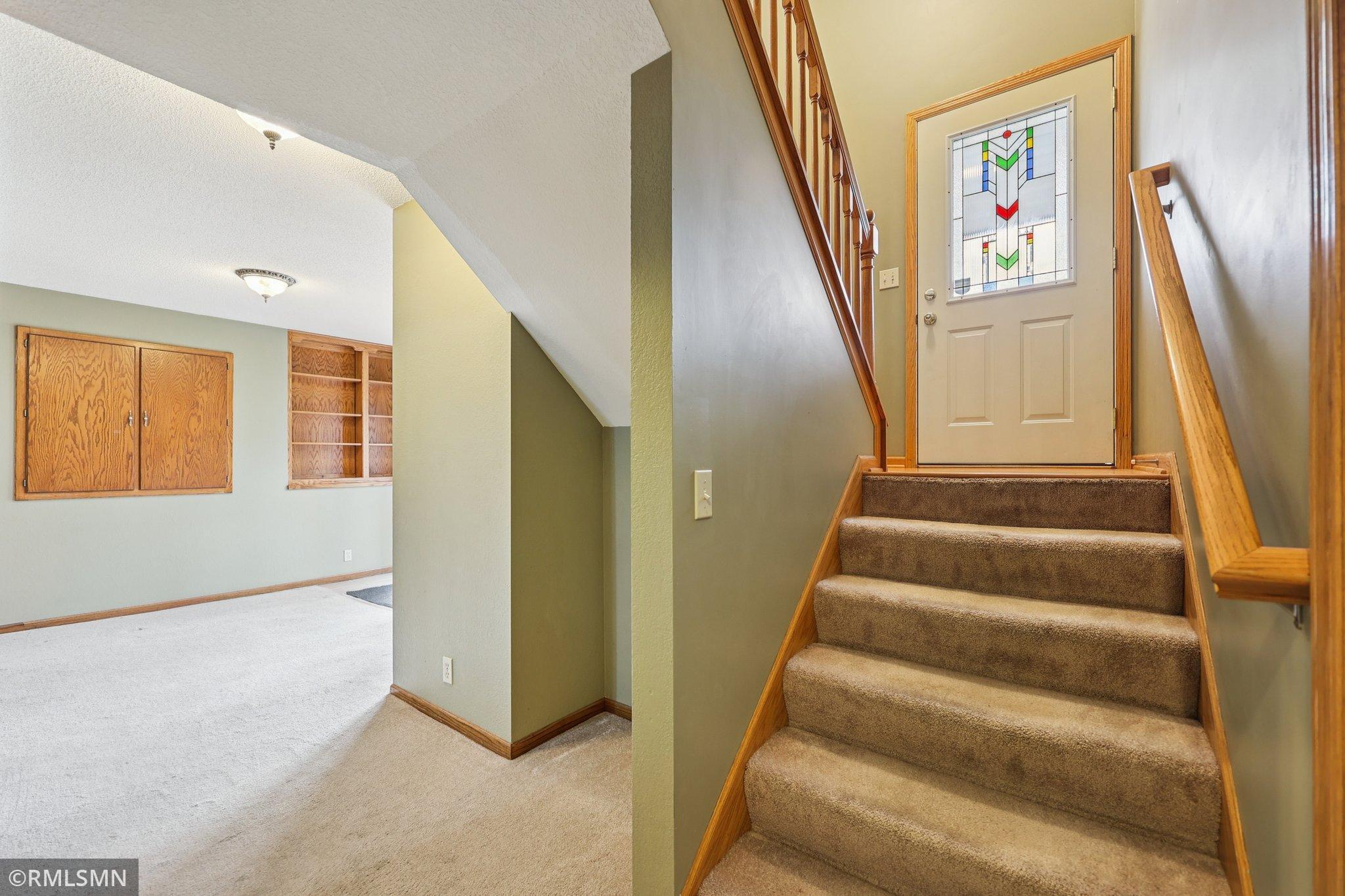 lower level view towards the 2nd entry from the bottom of the stairs