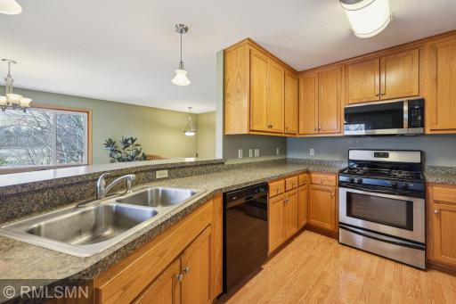 You have a lot of workspace in this well-laid-out kitchen. Don't let the pond views distract you from making dinner!